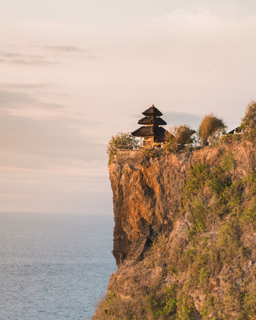 Famous for its dramatic cliffs and panoramic ocean views, Uluwatu is a must-visit destination for surfers and nature lovers
