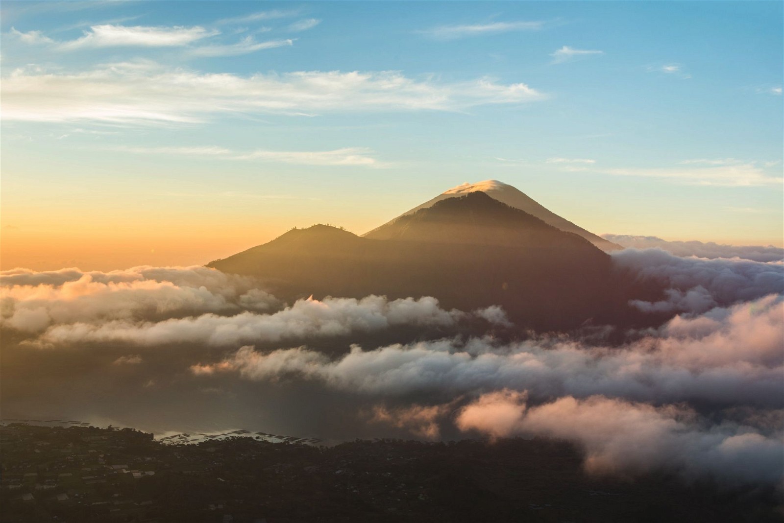 Embark on a sunrise trek to the summit of Mount Batur, an active volcano offering breathtaking panoramic views
