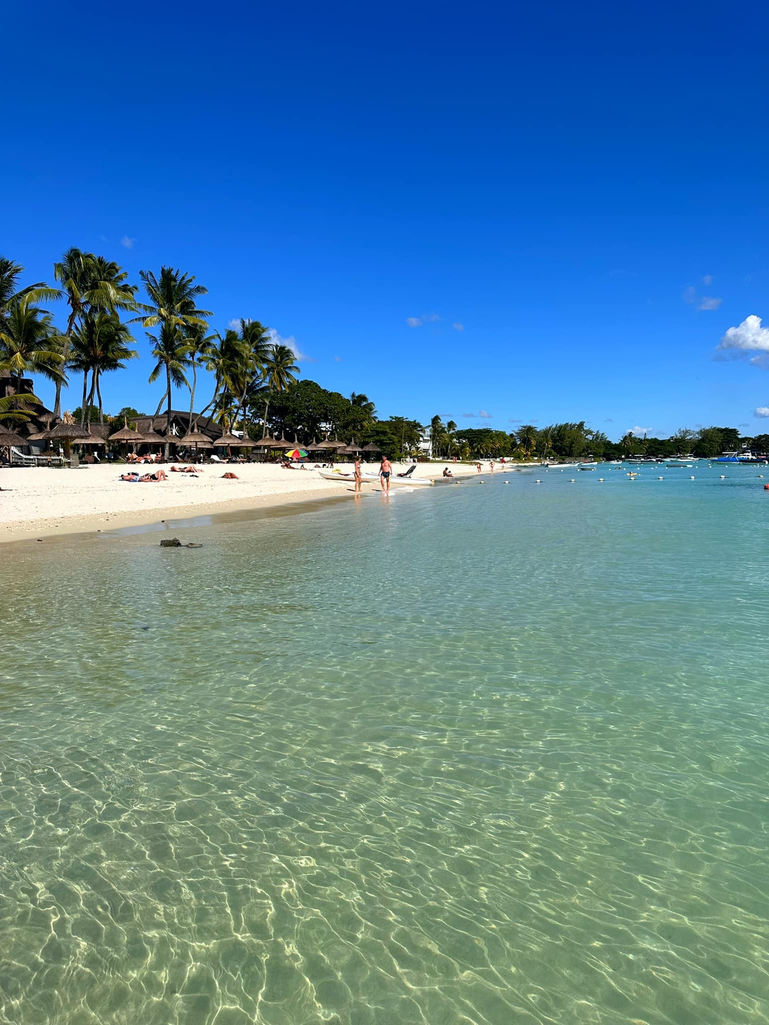 Blue Bay Beach entices with its crystalline turquoise waters and pristine white sands.