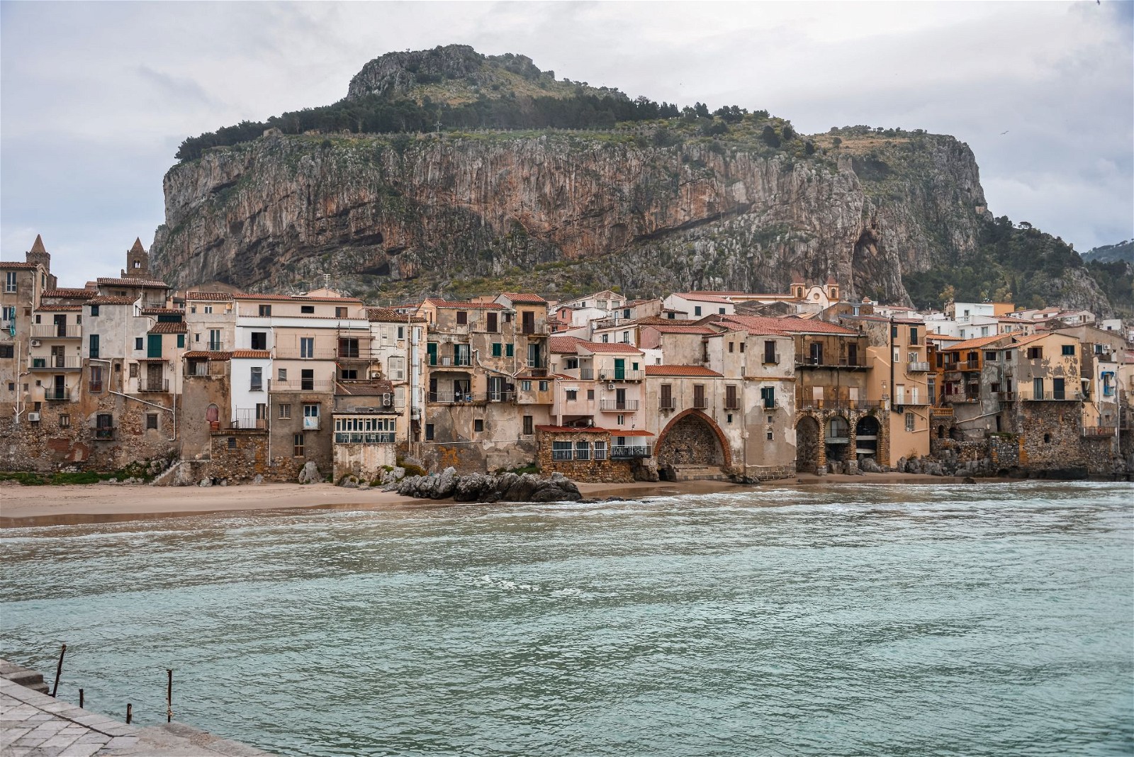 Cefalù is a picturesque coastal town known for its stunning beaches, crystal-clear waters, and historic center