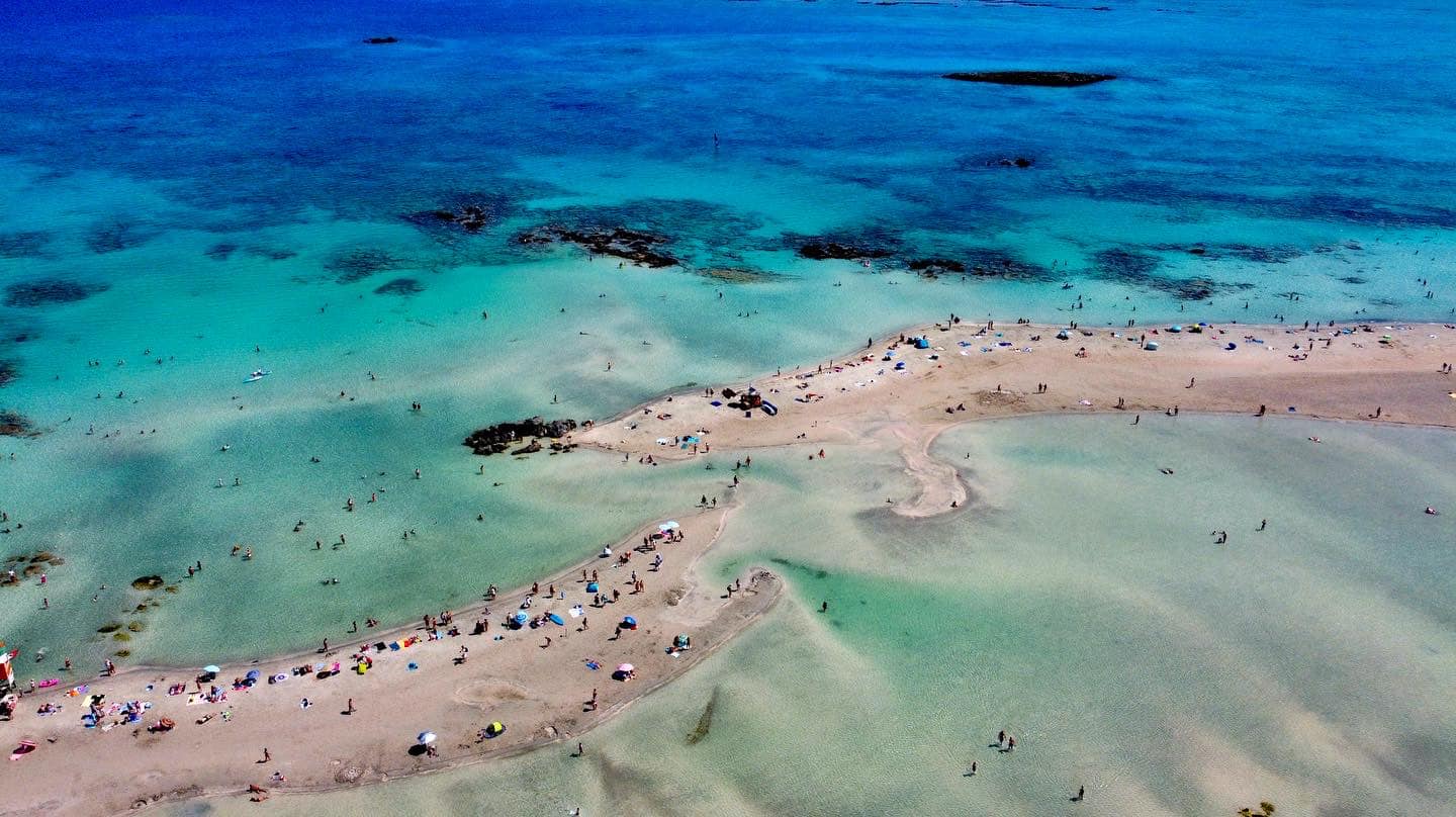 Elafonisi Beach, with its dreamy pink sands and turquoise waters, beckons travelers seeking a tranquil escape amidst the wonders of nature.